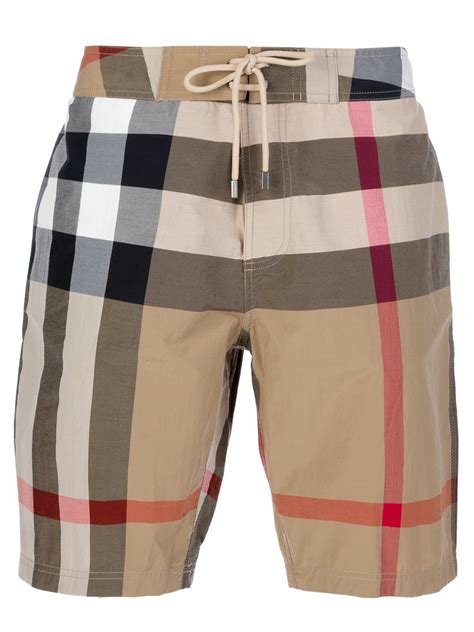 burberry brit rolled denim shorts|Burberry check panel trousers.